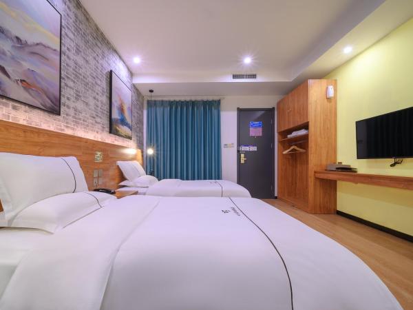 QiQiaoWu Fashion Hotel - Beijing Songjiazhuang Subway Station : photo 9 de la chambre chambre lits jumeaux deluxe
