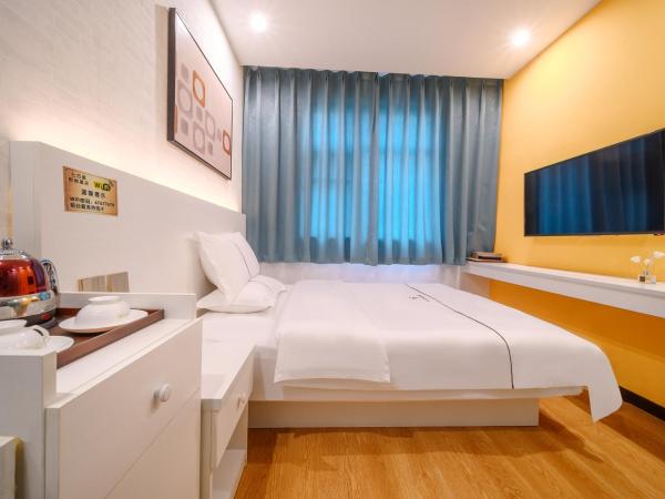 QiQiaoWu Fashion Hotel - Beijing Songjiazhuang Subway Station : photo 3 de la chambre chambre lit queen-size deluxe