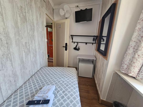 Graça Guest House : photo 2 de la chambre chambre simple avec salle de bains extérieure privative