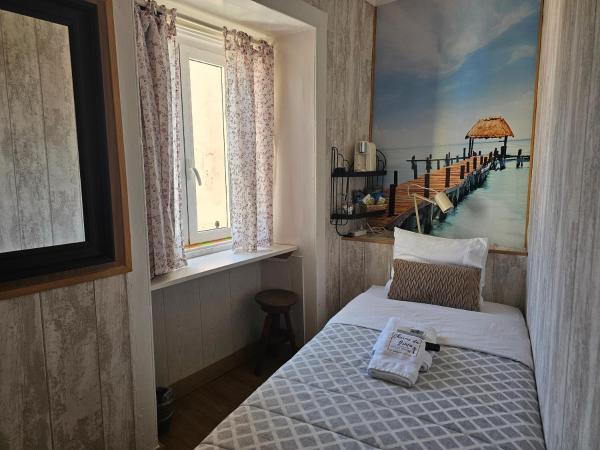 Graça Guest House : photo 1 de la chambre chambre simple avec salle de bains extérieure privative