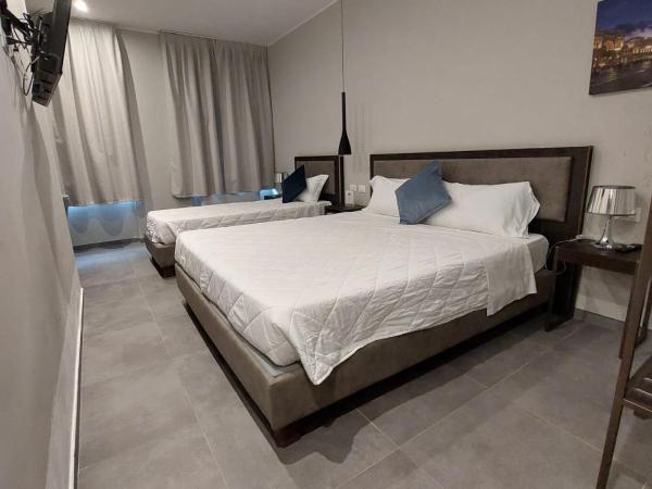 Hotel Vitruvio : photo 1 de la chambre chambre triple deluxe