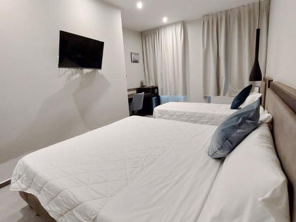 Hotel Vitruvio : photo 10 de la chambre chambre triple deluxe