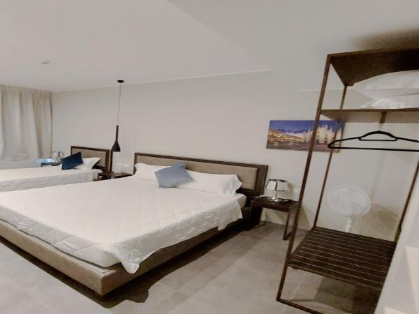 Hotel Vitruvio : photo 2 de la chambre chambre triple deluxe