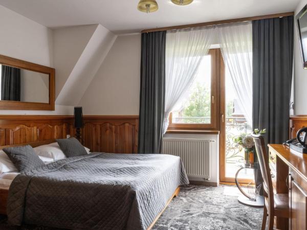 Sądelski Dwór Medical & SPA : photo 9 de la chambre chambre quadruple