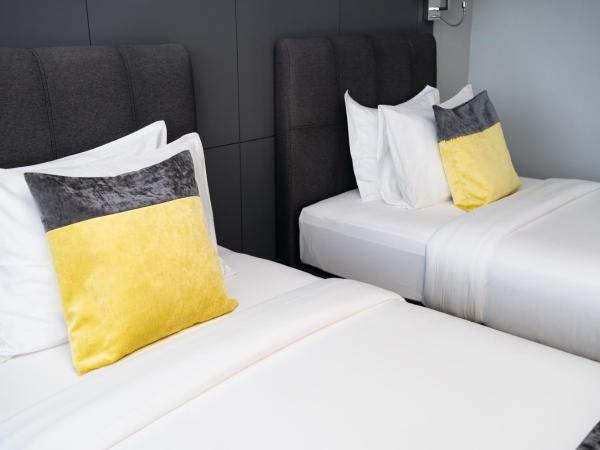 Manhattan Business Hotel, Male : photo 3 de la chambre chambre lits jumeaux standard (navette aéroport aller-retour gratuite et 10 % de réduction sur la nourriture et les boissons)