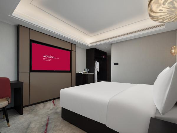 Mövenpick by Accor Binjiang Nanjing : photo 2 de la chambre chambre lit king-size deluxe