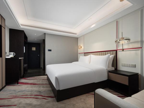 Mövenpick by Accor Binjiang Nanjing : photo 4 de la chambre chambre lit king-size deluxe
