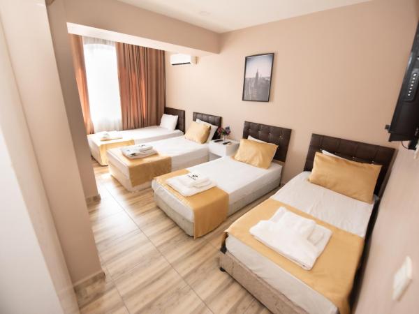 Nalvan Apart : photo 9 de la chambre chambre quadruple Économique