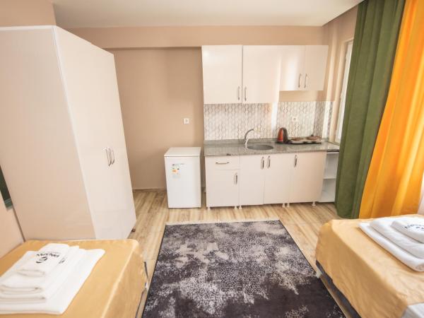 Nalvan Apart : photo 3 de la chambre chambre quadruple Économique