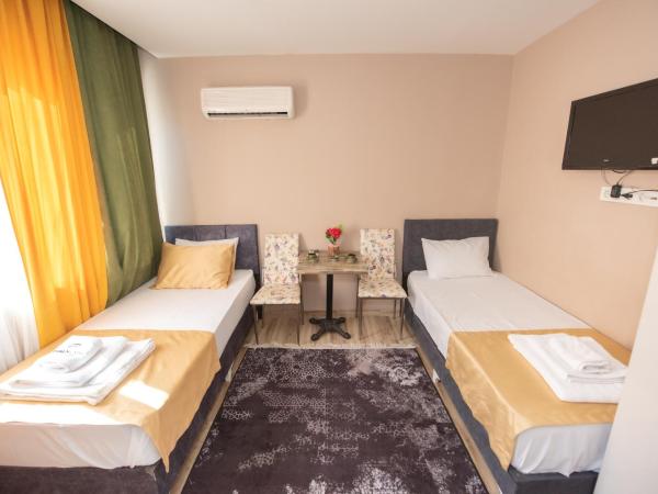 Nalvan Apart : photo 6 de la chambre chambre quadruple Économique