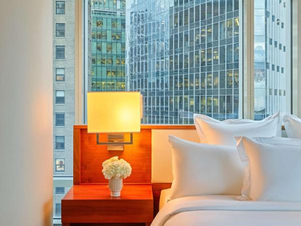 Fairmont Pacific Rim : photo 3 de la chambre suite avec lit king-size - vue sur stanley park
