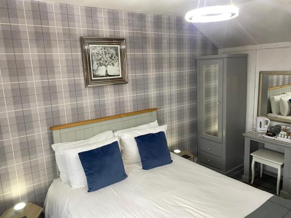 The Fossil Tree Hotel : photo 5 de la chambre chambre double - vue partielle sur mer.