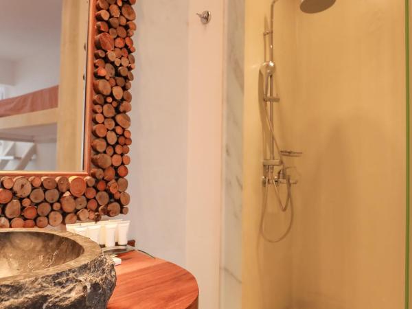Ibiscus Boutique : photo 10 de la chambre grande suite avec jacuzzi extérieur
