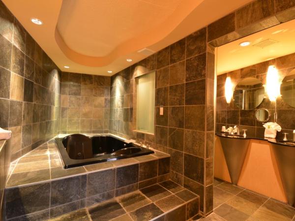 iHotel and Conference Centre Red Deer : photo 3 de la chambre suite lit king-size avec jacuzzi - non-fumeurs