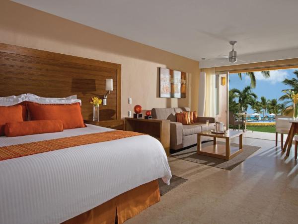 Secrets Aura Cozumel - Adults Only : photo 5 de la chambre suite junior club privilège lit king-size - vue sur piscine