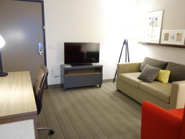 Country Inn & Suites by Radisson Houston Westchase-Westheimer : photo 1 de la chambre suite lit king-size avec canapé-lit - non-fumeurs