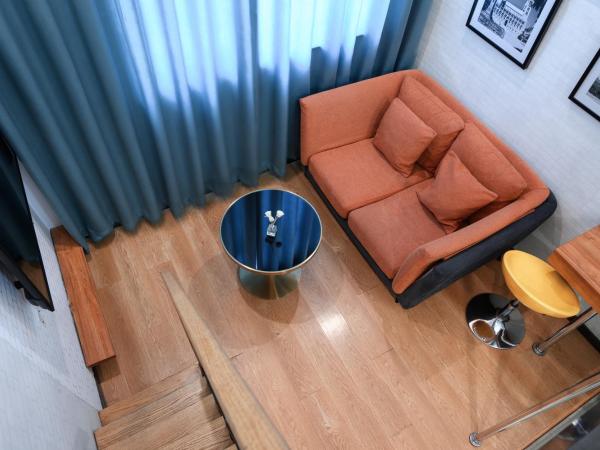 QiQiaoWu Fashion Hotel - Beijing Songjiazhuang Subway Station : photo 1 de la chambre suite