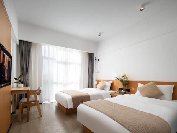 原野映像酒店 : photo 2 de la chambre chambre lits jumeaux