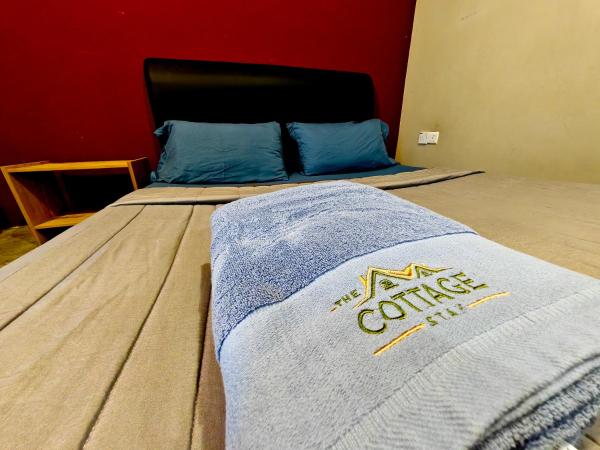 The Cottage Stay - self check-in : photo 4 de la chambre chambre quadruple Économique avec salle de bains commune