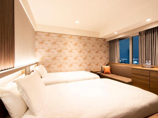 karaksa hotel grande Shin-Osaka Tower : photo 3 de la chambre hébergement lits jumeaux supérieur - Étage supérieur