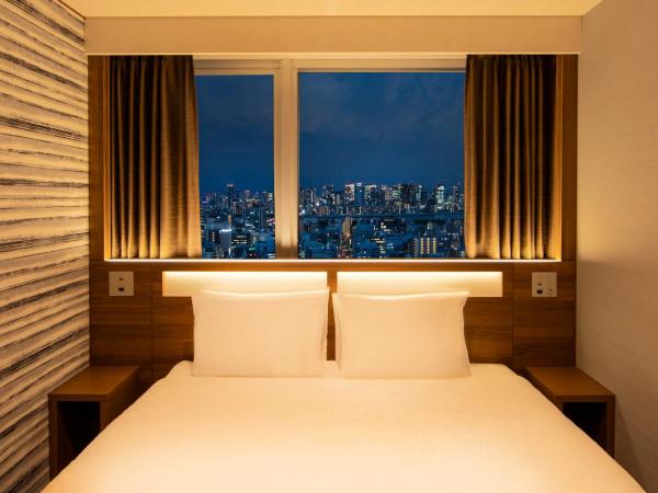 karaksa hotel grande Shin-Osaka Tower : photo 1 de la chambre hébergement double supérieur - Étage supérieur