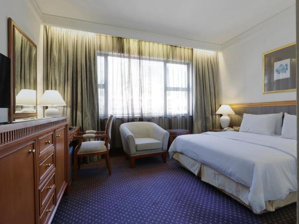 The Jesselton Hotel : photo 1 de la chambre hébergement lit queen-size supérieur