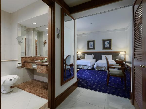 The Jesselton Hotel : photo 3 de la chambre hébergement lits jumeaux deluxe 