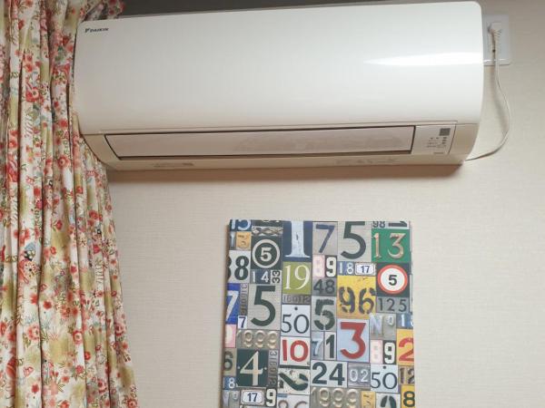 Guesthouse YOURS : photo 7 de la chambre chambre quadruple avec balcon 