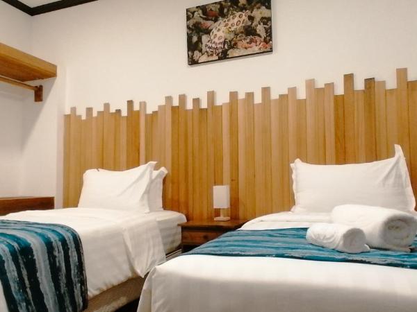 Mamutik Island Resort : photo 5 de la chambre chambre lits jumeaux deluxe