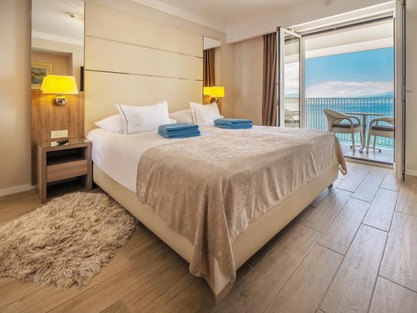 Hotel Vila Rova : photo 1 de la chambre deux chambres doubles communicantes avec vue sur la mer