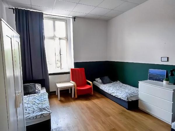 Hostel Stawowa : photo 1 de la chambre chambre triple avec salle de bains commune