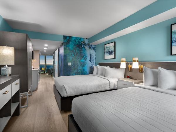 Crown Reef Beach Resort and Waterpark : photo 3 de la chambre suite lit king-size - vue sur océan