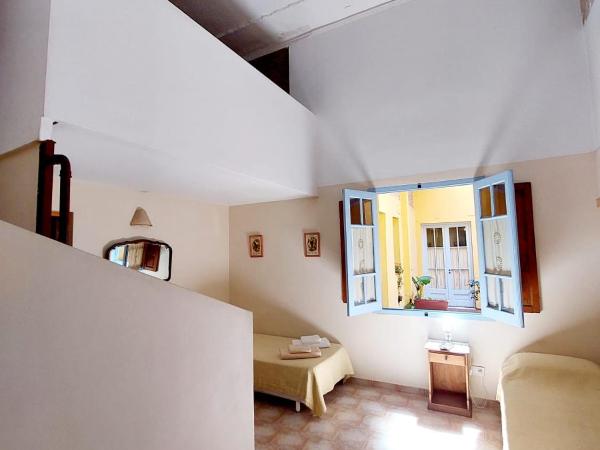 La Querencia de Buenos Aires : photo 1 de la chambre chambre familiale avec salle de bains privative