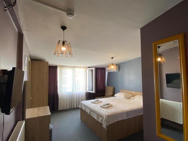 Retro Suites : photo 1 de la chambre chambre triple standard