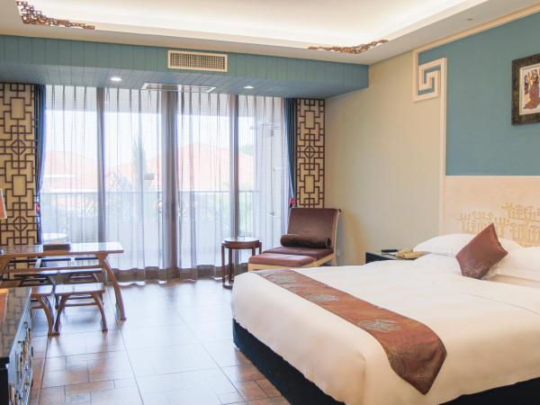 Luhuitou State Guesthouse & Resort : photo 6 de la chambre chambre lit king-size deluxe - vue sur jardin