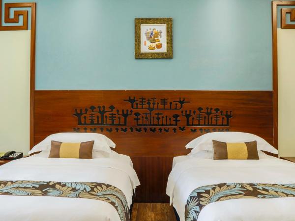 Luhuitou State Guesthouse & Resort : photo 4 de la chambre chambre lits jumeaux supérieure – vue sur jardin