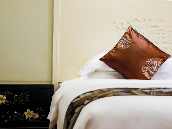 Luhuitou State Guesthouse & Resort : photo 2 de la chambre chambre lits jumeaux supérieure – vue sur jardin