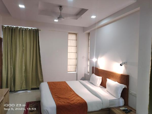 Pacific Inn Green, Gurgaon : photo 8 de la chambre chambre lit king-size