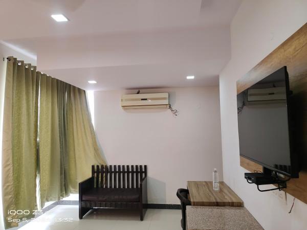 Pacific Inn Green, Gurgaon : photo 10 de la chambre chambre lit king-size deluxe