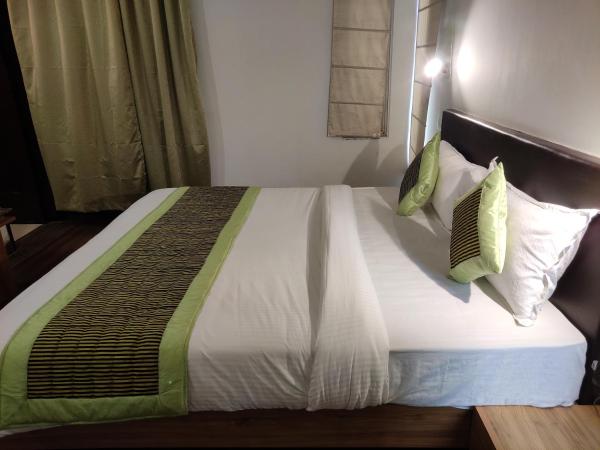 Pacific Inn Green, Gurgaon : photo 6 de la chambre chambre lit king-size