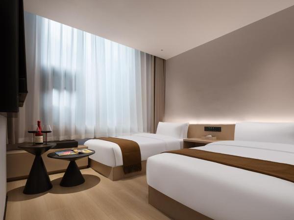 Guanran Hotel - Yongningmen Subway Station : photo 3 de la chambre chambre lits jumeaux supérieure