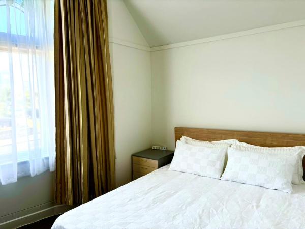 Newmarket Cozy-home : photo 3 de la chambre chambre double deluxe (2 adultes + 1 enfant)