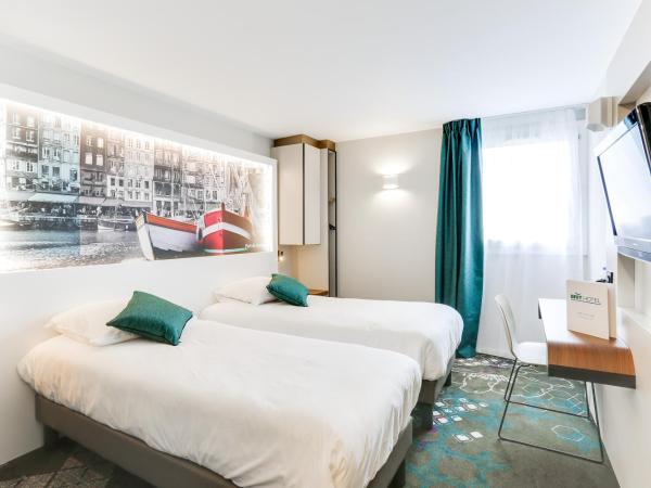 Brit Hotel Caen Nord - Mémorial : photo 5 de la chambre chambre lits jumeaux