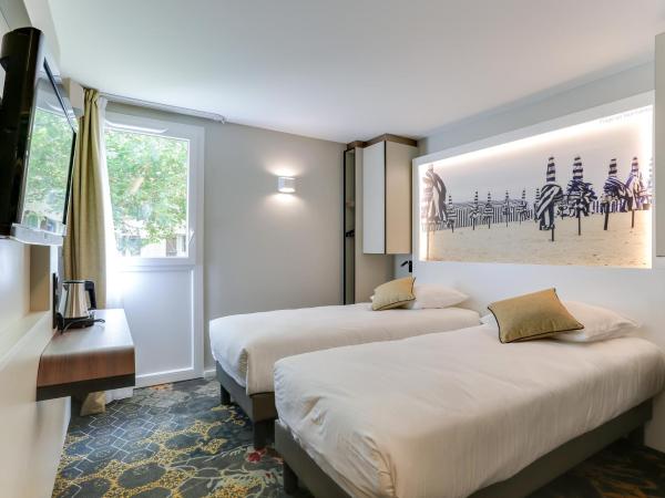 Brit Hotel Caen Nord - Mémorial : photo 6 de la chambre chambre lits jumeaux