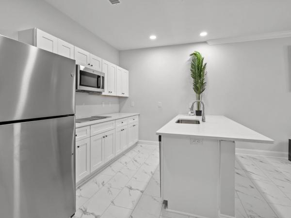 Ocean Escape Condos North : photo 2 de la chambre four-bedroom condo with balcony