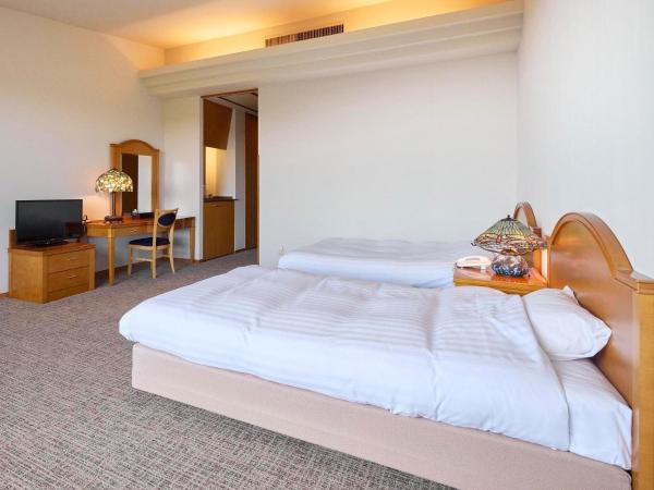 Arcadia : photo 2 de la chambre chambre lits jumeaux - vue sur montagne