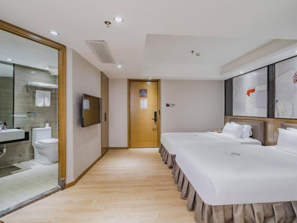 Insail Hotels (Pazhou Exhibition Center KeCun Metro Station Dunhe Road Branch Guangzhou) : photo 3 de la chambre chambre lits jumeaux standard