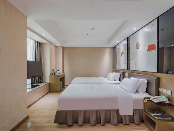 Insail Hotels (Pazhou Exhibition Center KeCun Metro Station Dunhe Road Branch Guangzhou) : photo 10 de la chambre chambre lits jumeaux deluxe