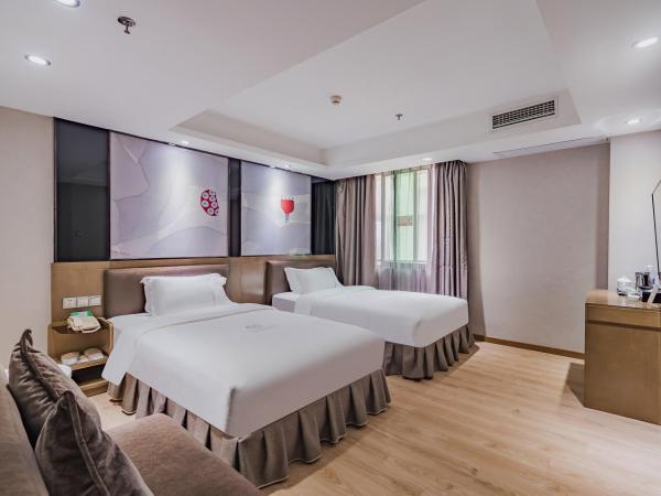 Insail Hotels (Pazhou Exhibition Center KeCun Metro Station Dunhe Road Branch Guangzhou) : photo 8 de la chambre chambre lits jumeaux deluxe