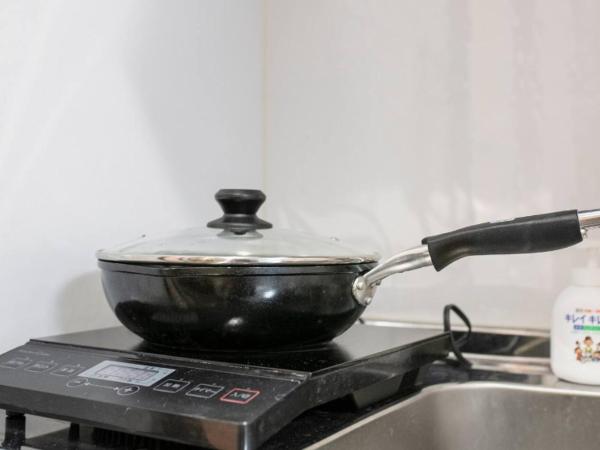 Uhome Tabata Apartment : photo 6 de la chambre chambre simple avec salle de bains 